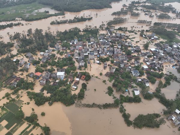 Unrelenting rain causes more than 100 landslides, traps residents in floodwaters in southern China