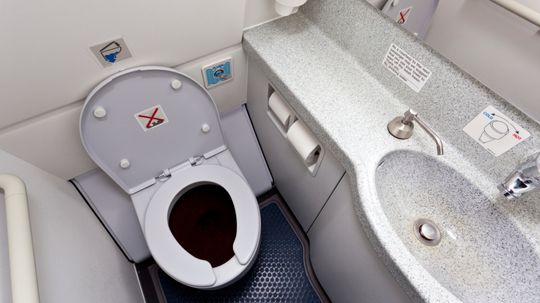 How does the toilet in a commercial airliner work?