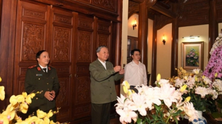 Minister To Lam visits and extends Tet wishes to family of late President Tran Dai Quang