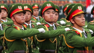 Minister Phan Van Giang and Minister To Lam review rehearsal of armed forces parade in celebration of Dien Bien Phu Victory