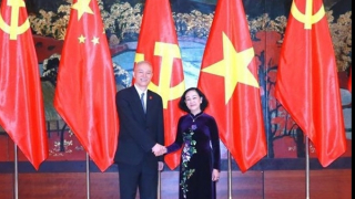 Vietnam gives top priority to developing ties with China: Party official