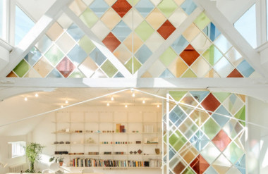 Stained glass dividers brighten London co-working space inside former church