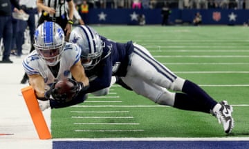 NFLCowboys đánh bại những chú sư tử giận dữ sau khi thực hiện quả phạt đền để giành được hai điểm