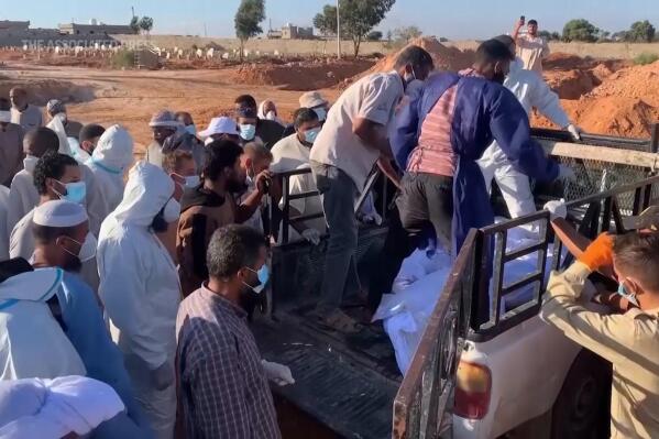 Search teams bury flood victims in Libya, public prosecutor vows criminal cases over dam disaster