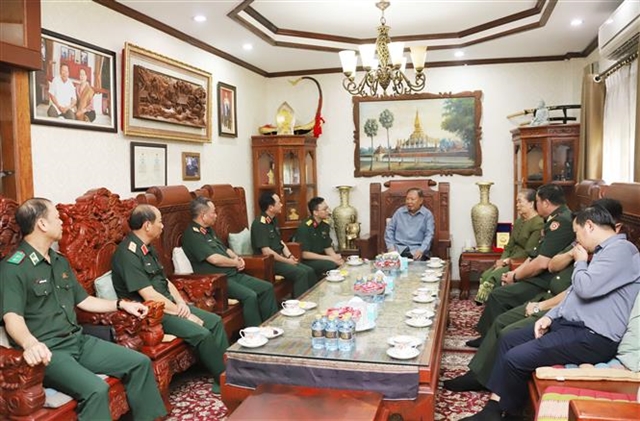 Official calls for stronger ties between military schools of Việt Nam, Laos