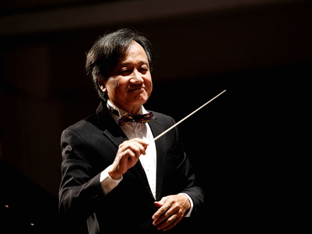 Veteran conductor researches Vietnamese music theory