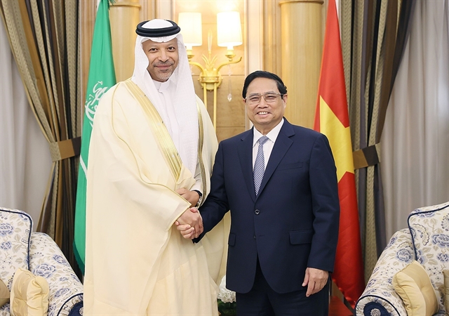 PM Chính welcomes investments from Aramco, Saudi Fund for Development