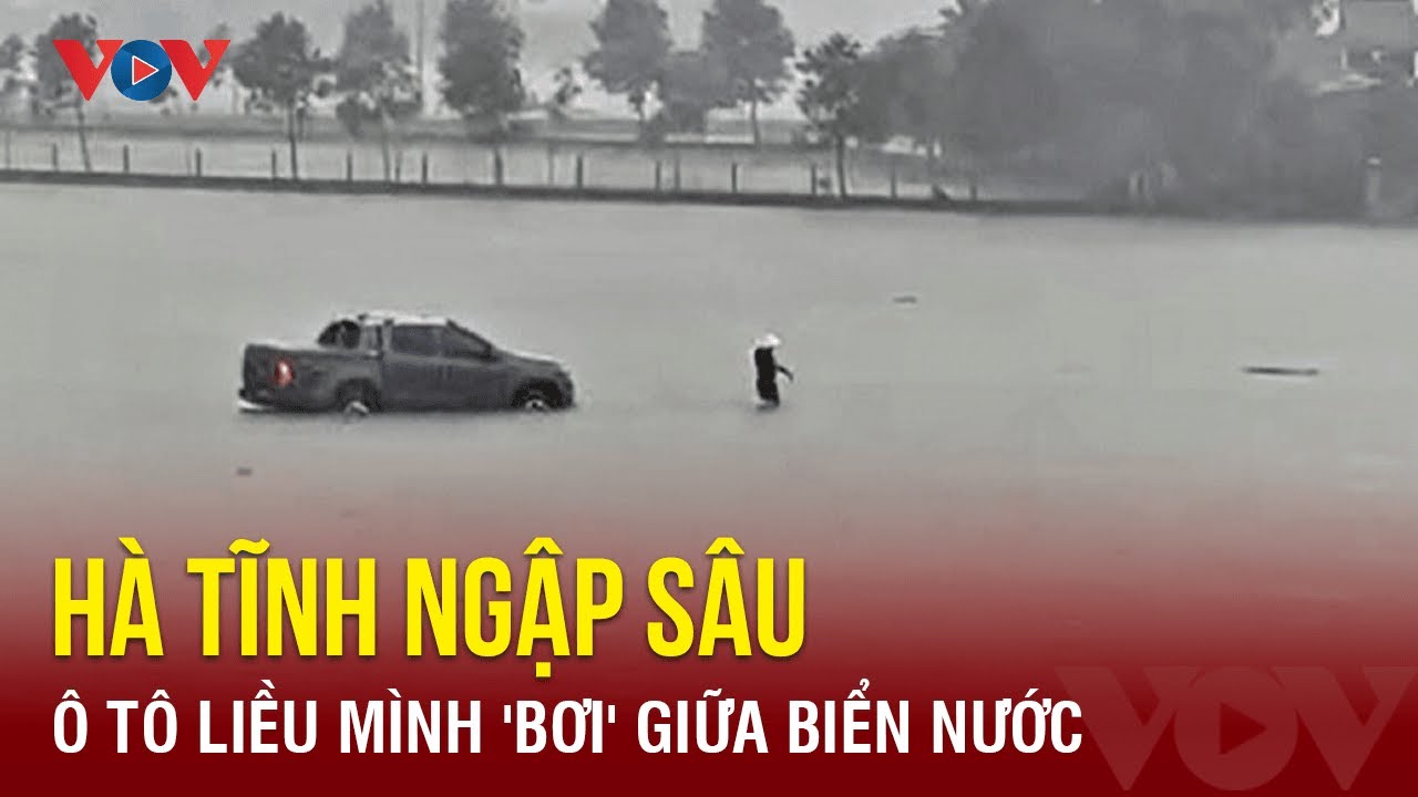 Nhiều nơi ở Hà Tĩnh ngập sâu, ô tô liều mình 'bơi' giữa biển nước | Báo Điện tử VOV