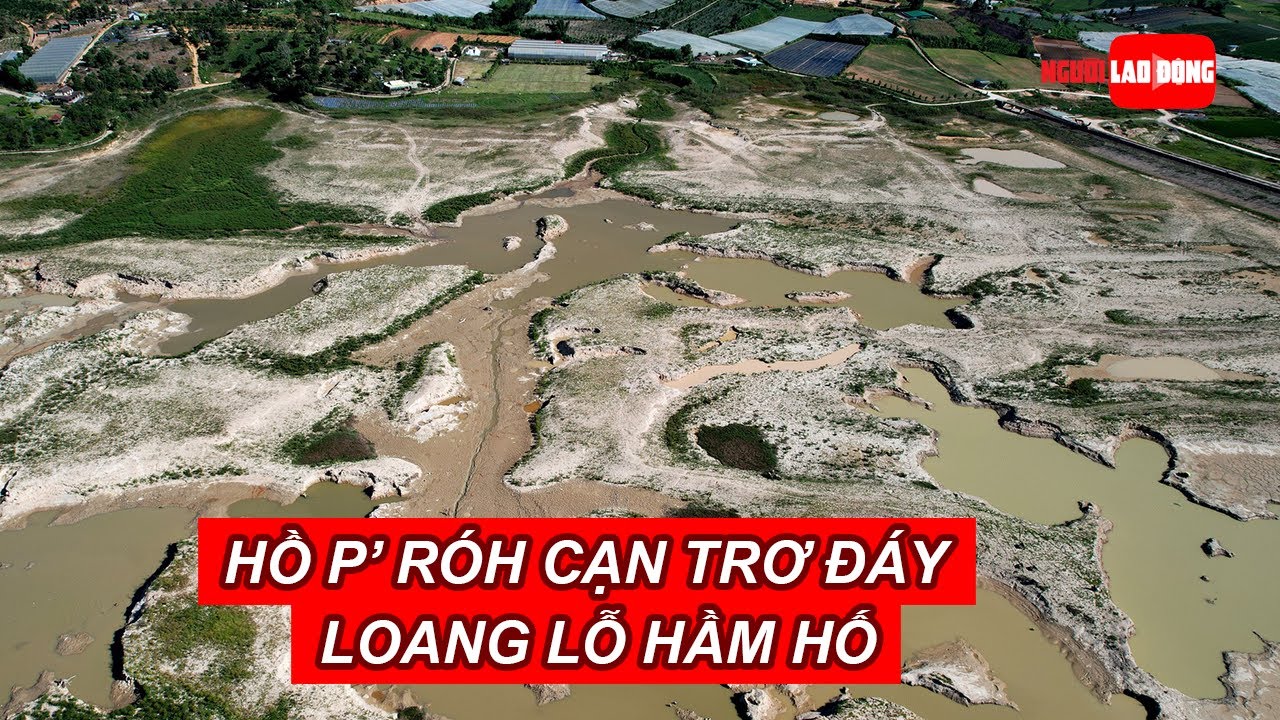 Hồ P'róh cạn trơ đáy, loang lỗ hầm hố nghi khai thác cát | Báo Người Lao Động