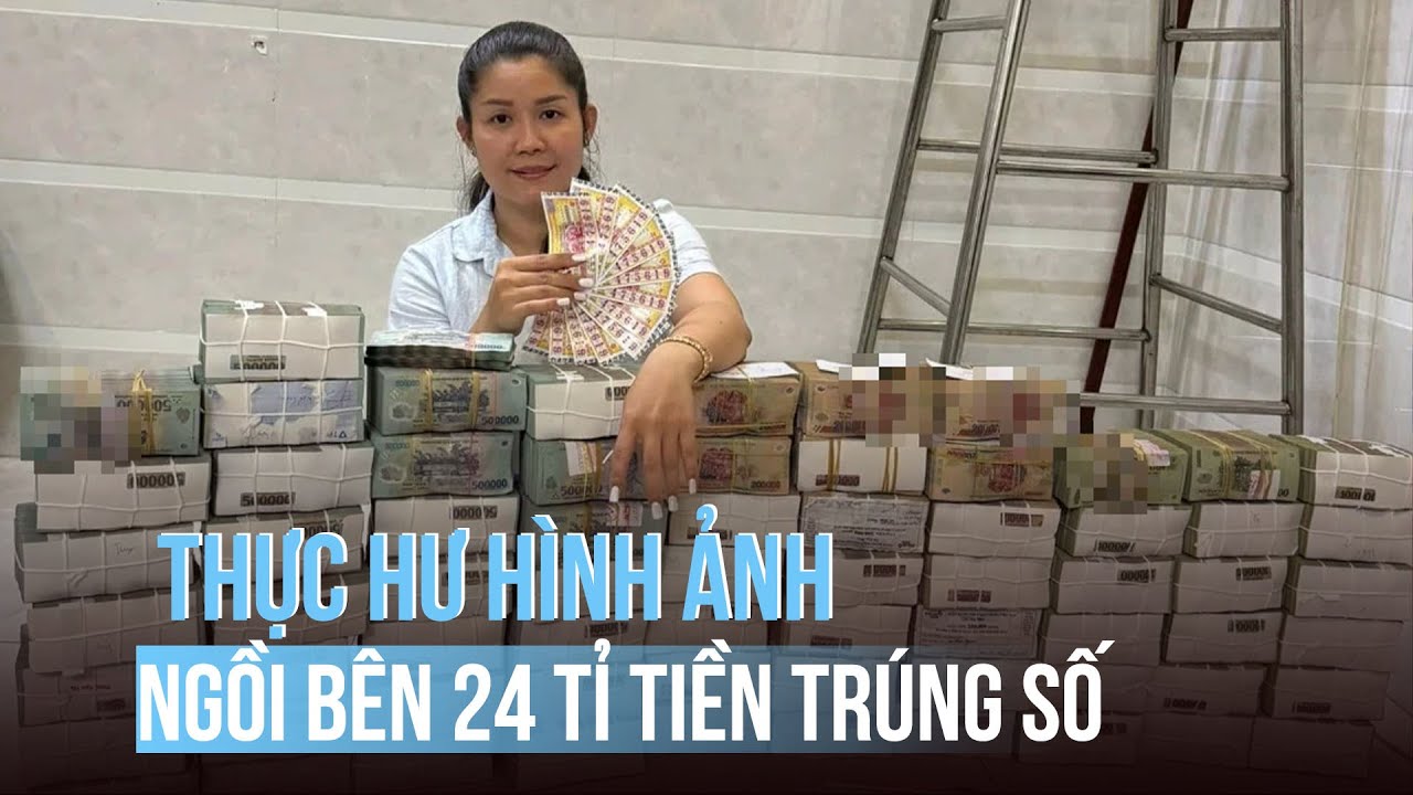 Ngồi bên nhiều cọc tiền trúng số độc đắc 24 tỉ, người phụ nữ trong ảnh nói gì?