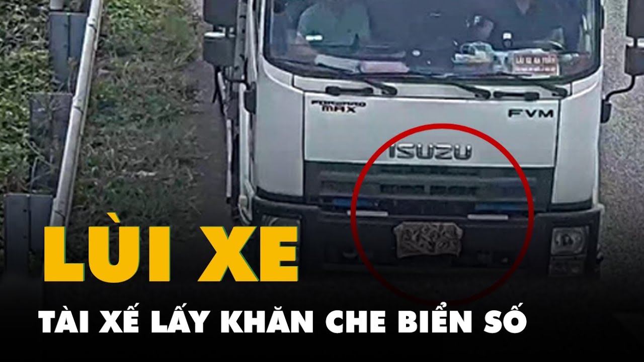 Tài xế xe tải lấy khăn vải che biển số để đi lùi trên cao tốc