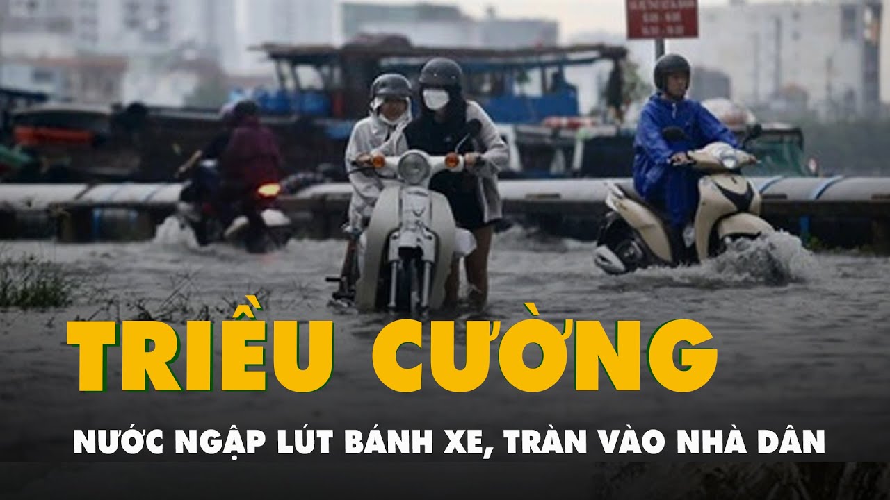 Triều cường bủa vây, nước ngập lút bánh xe, tràn vào nhà dân ở TP.HCM