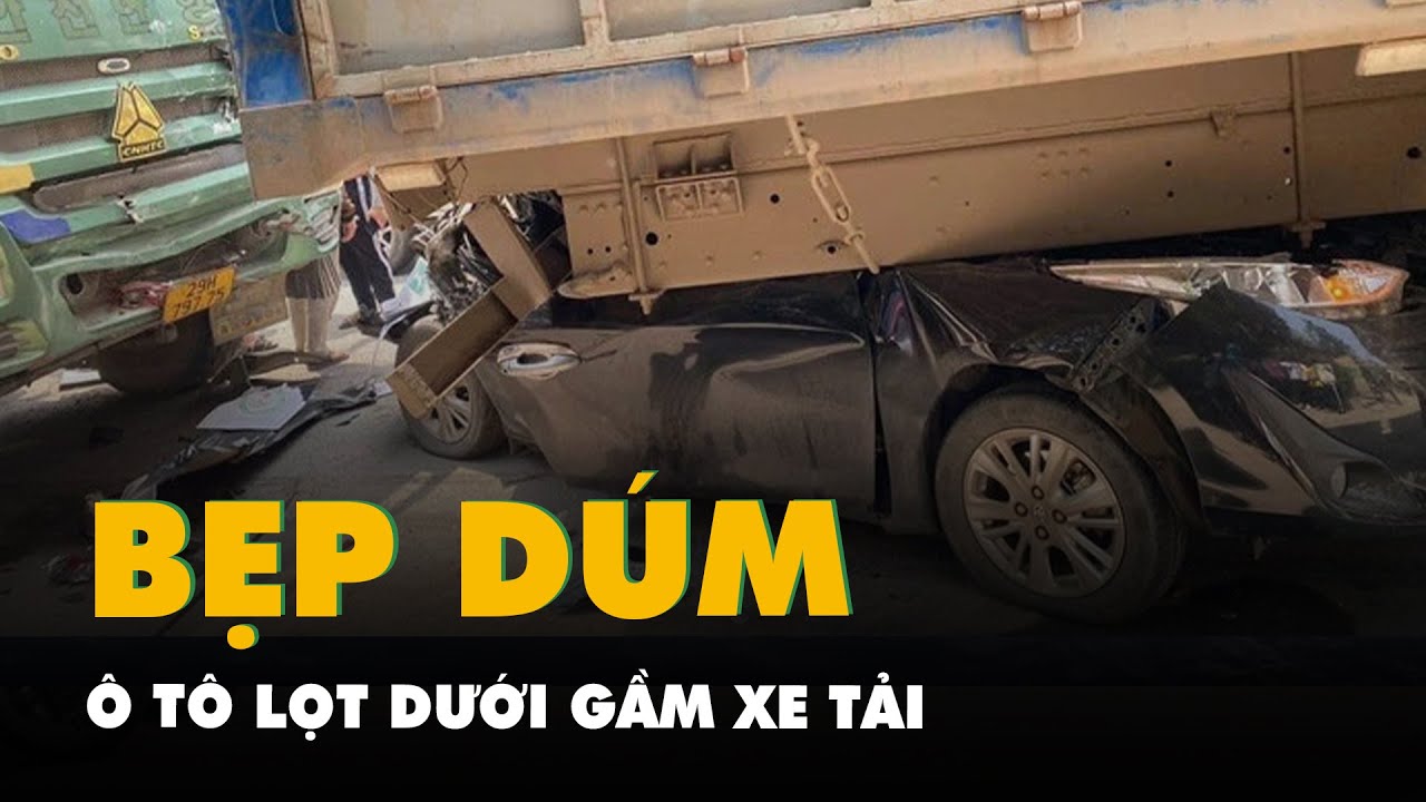 Ô tô con bẹp dúm, lọt dưới gầm xe tải sau tai nạn liên hoàn ở Hà Nội