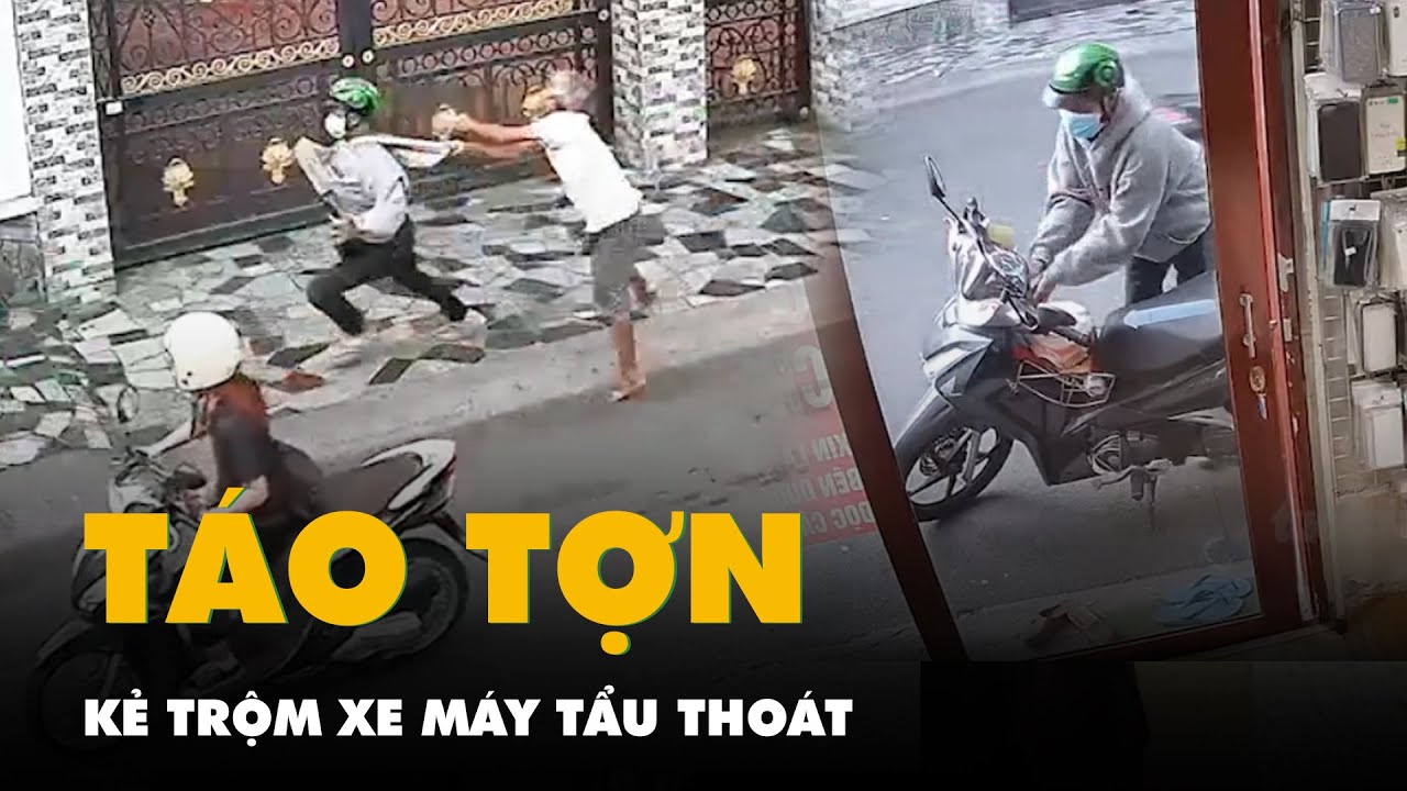 Camera quay cảnh người đàn ông đuổi theo 2 thanh niên trộm xe máy ở Thủ Đức