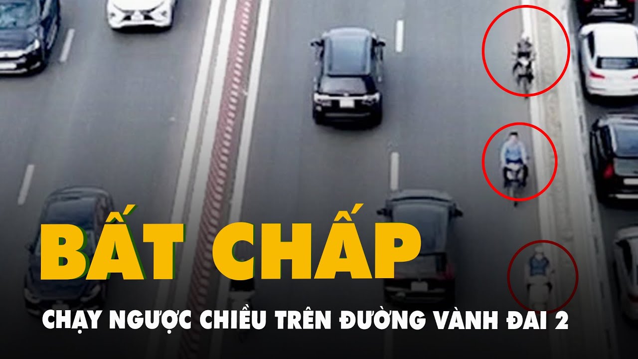 Bất chấp nguy hiểm, nhiều xe máy chạy ngược chiều đường vành đai 2 trên cao ở Hà Nội