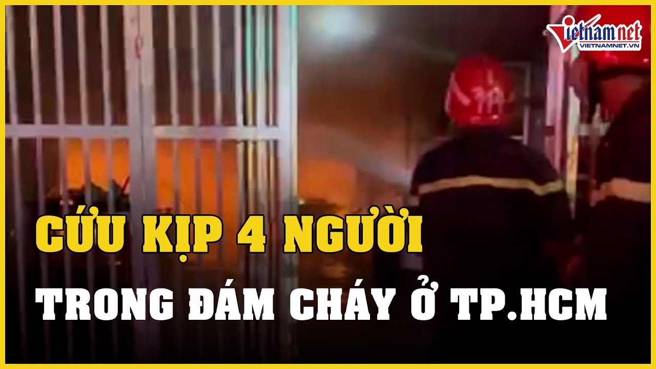 Cứu kịp thời 4 người mắc kẹt trong đám cháy ở TP.HCM | Báo VietNamNet