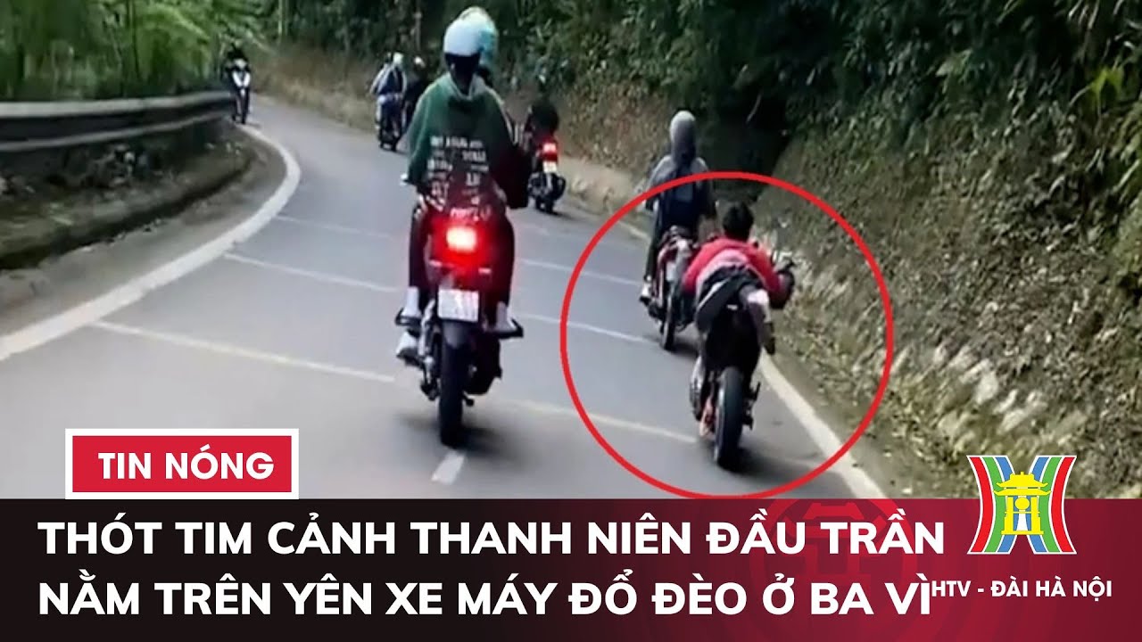 Thót tim cảnh thanh niên đầu trần nằm trên yên xe máy đổ đèo ở Ba Vì | Tin tức