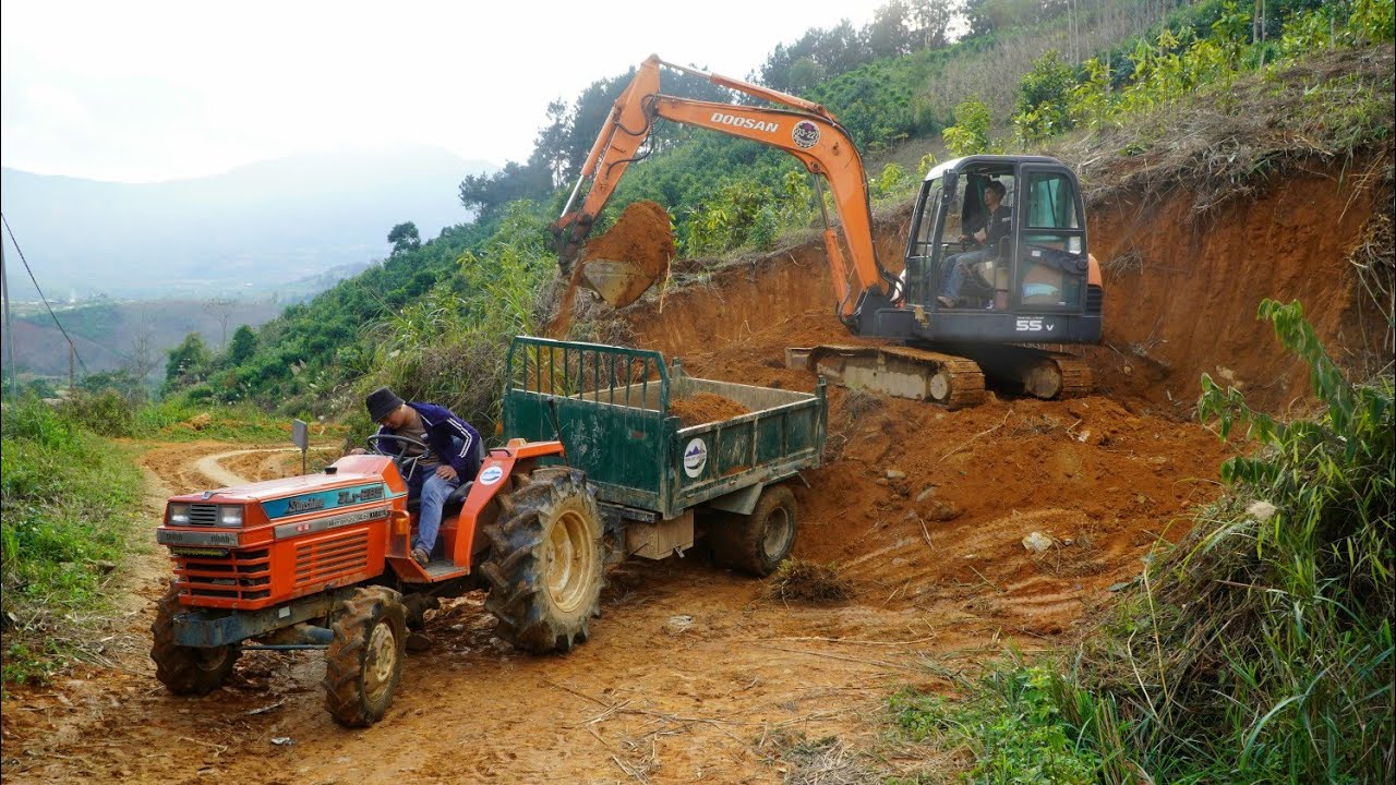 Cầu Bản Khe Vác (T39) Dân bản hiến đất Quế để đắp đường dẫn - Máy xúc Trắc Tơ làm việc liên hoàn