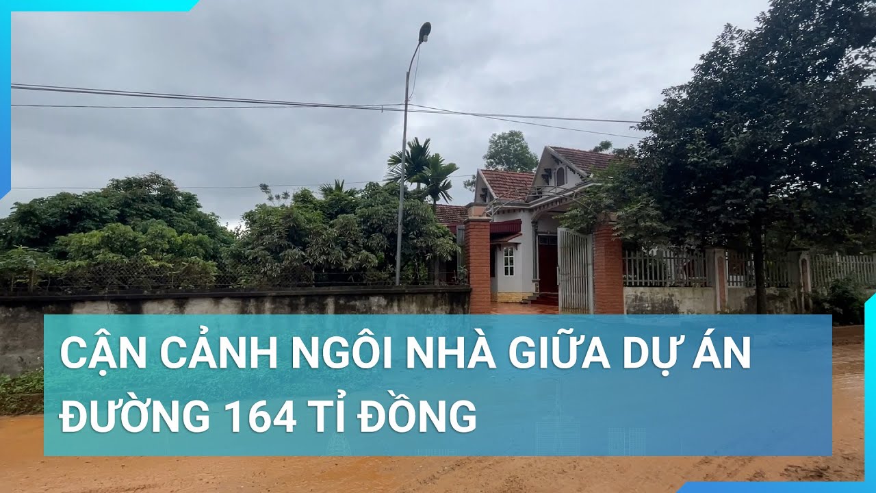 Cận cảnh hình ảnh ngôi nhà nằm "chình ình" giữa tuyến đường 164 tỷ đồng | Cuộc sống 24h