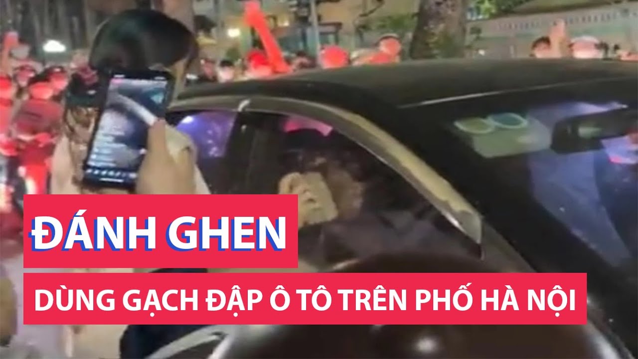 Người phụ nữ nghi đánh ghen, dùng gạch đập ô tô trên phố Hà Nội