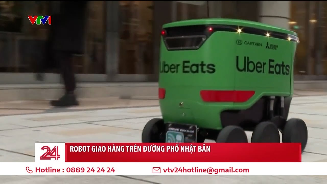 Robot giao đồ ăn tung tăng chạy trên đường phố Nhật Bản | VTV24