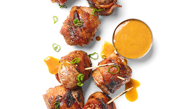 Bacon-Wrapped Brats with Mustard BBQ Sauce