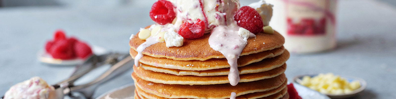 Buttermilk Pancakes with Crushed Meringue, Fresh Berries, White Chocolate Chips and Ice Cream