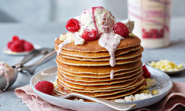 Buttermilk Pancakes with Crushed Meringue, Fresh Berries, White Chocolate Chips and Ice Cream