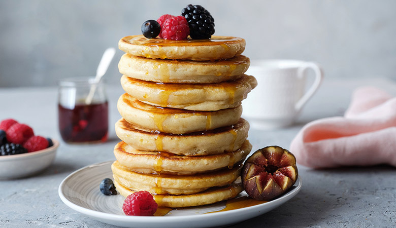 Fluffy Vegan Pancakes with Syrup & Berries