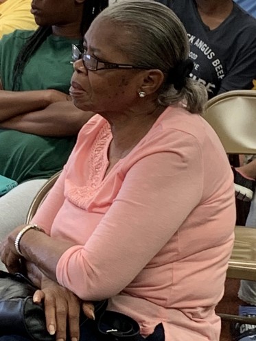 A Resident Intently Listening During the 2019 Resident Meeting