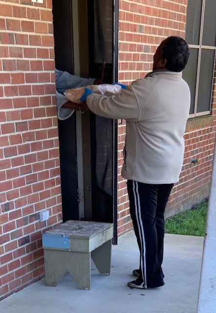 Staff handing out food 