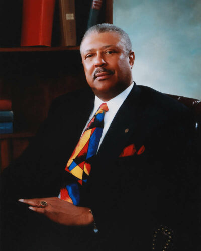 Dr. Grant Henry, Chairman