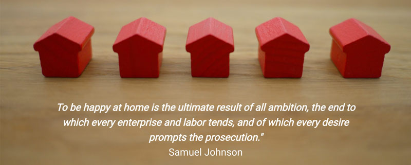 A line of wooden toy houses with text that reads: To be happy at home is the ultimate result of all ambition, the end to which every enterprise and labor tends, and of which every desire prompts the prosecution." Samuel Johnson "As you grow older, you will discover that you have two hands, one for helping yourself, the other for helping others." Audrey Hepburn.