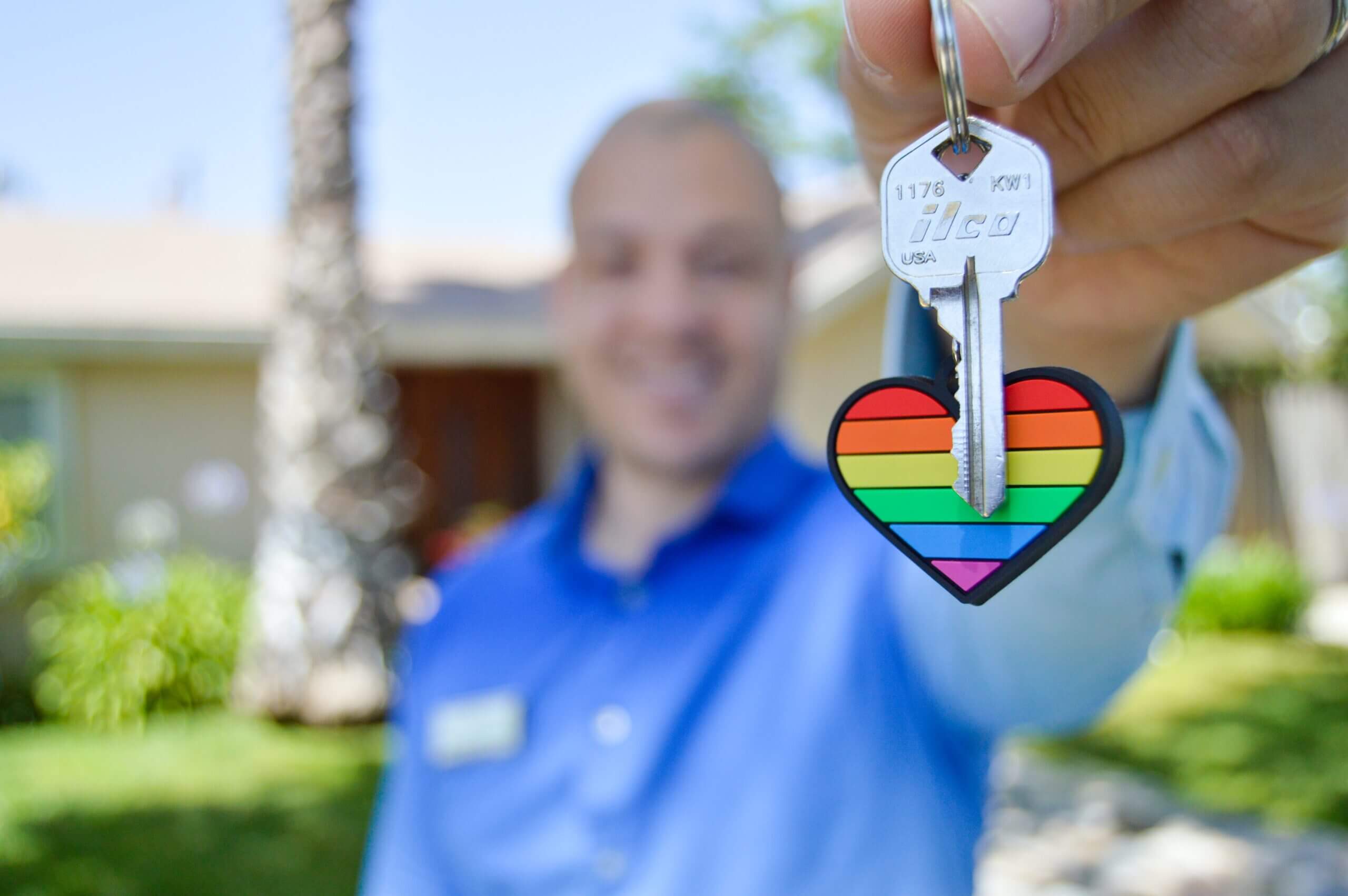 A man holding a key.