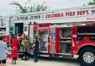 Event attendees gather to tour the Columbia Fire Department Fire Engine