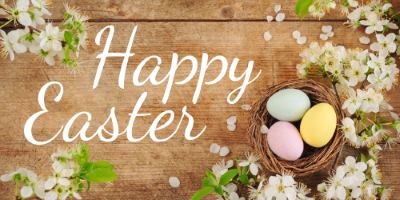 Happy Easter and a nest with three eggs
