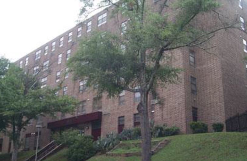 A street view of the Arrington Manor apartment building.