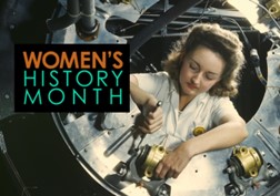 Women's History Month. A woman working on an airplane.