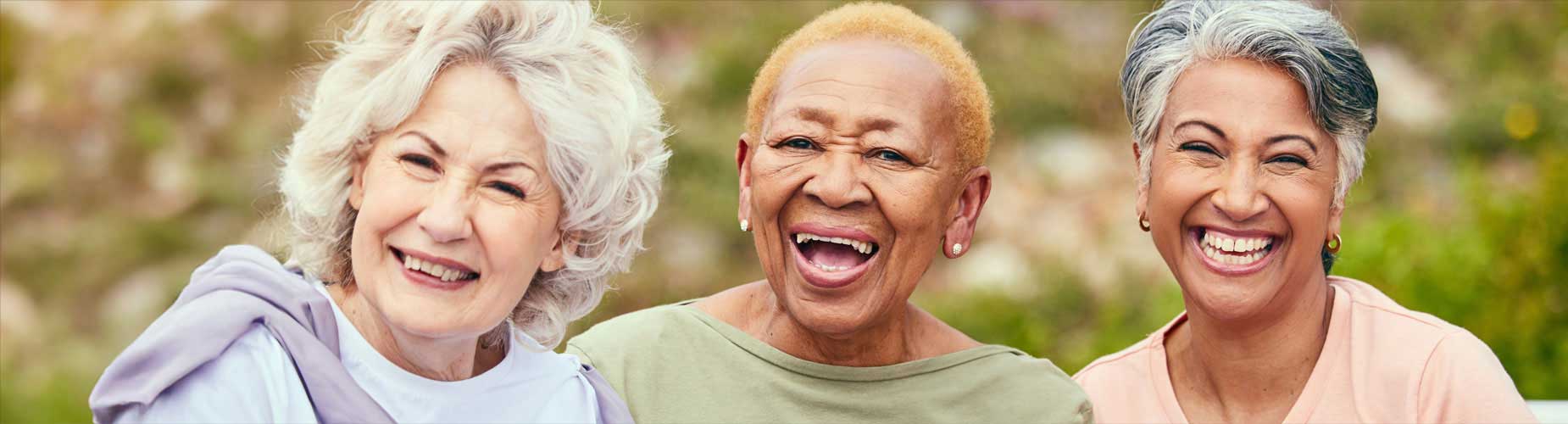 Three smiling women