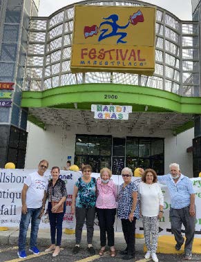 Group standing in front of the Festival Marketplace.
