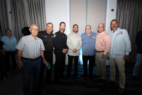 Group of men standing in a row.