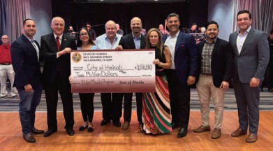 Secretary Branham presented 2M check for the elderly hot meals program with elected officials Senator Avila, State Representative Alex Rizo, State Representative Tom Fabricio, and State Representative David Borrero.