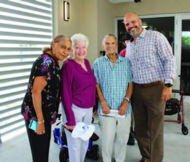 A small group of elderly smiling.