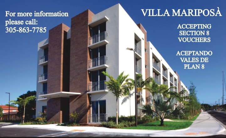 Text around building stating For more information please call: 305.863.7785 Villa Mariposa Accepting Section 8 Vouchers.