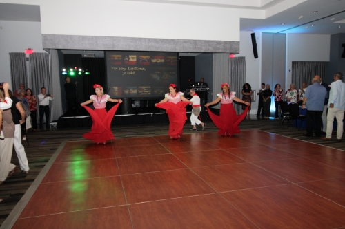 Ladies dancing at the Hispanic Heritage Party.