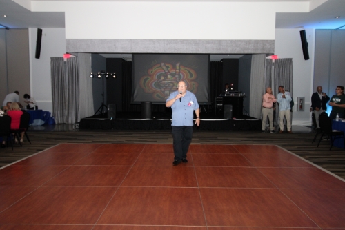 Man in the middle of the dance floor.