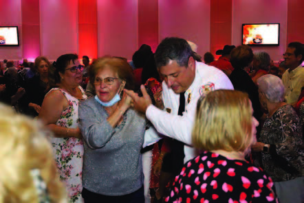 A man and a woman dancing.