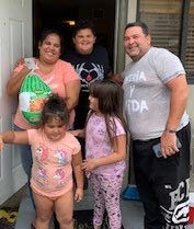 Family with their frozen turkey.