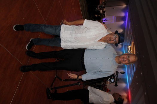 two men standing next to each other.