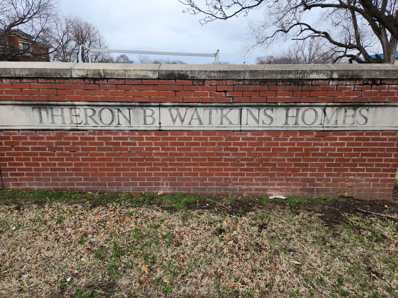 A sign that reads Theron B. Watkins Homes.